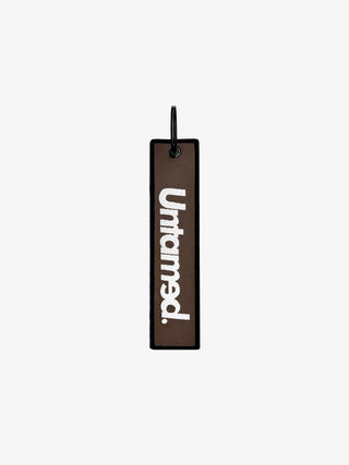 UNTAMED BLUE JET TAG