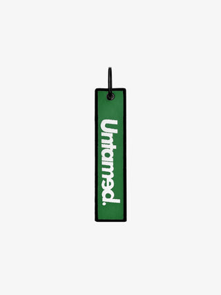 UNTAMED GREEN JET TAG