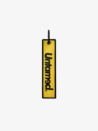 UNTAMED YELLOW JET TAG